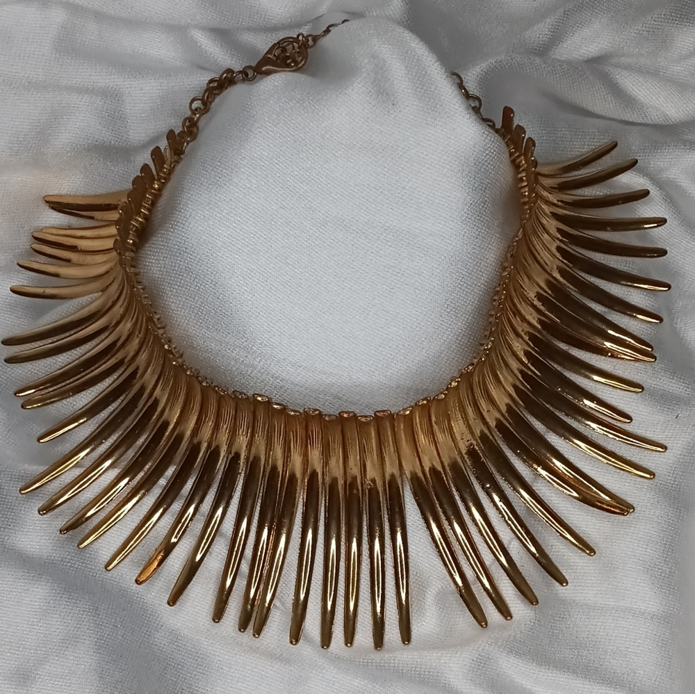 Gold colored statement necklace